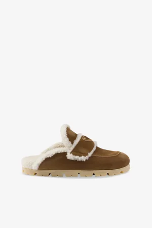 Prada Womens Lugged-Sole Triangle-Plaque Suede and Shearling Slippers