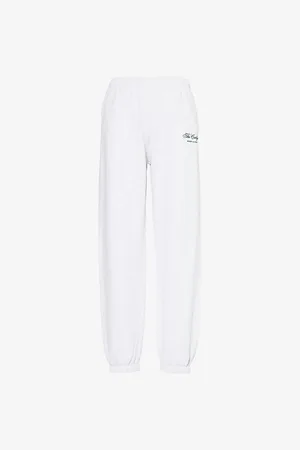 Sporty & Rich Womens The Carlyle Script Relaxed Cotton-Jersey Jogging Bottoms