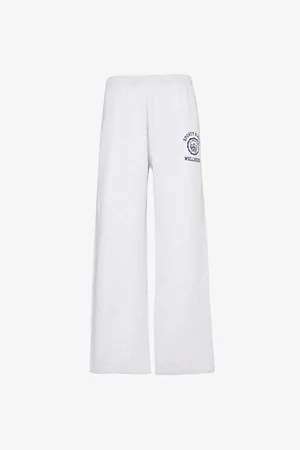 Sporty & Rich Womens Emblem Brand-Print Straight-Leg Mid-Rise Cotton-Jersey Jogging Bottoms