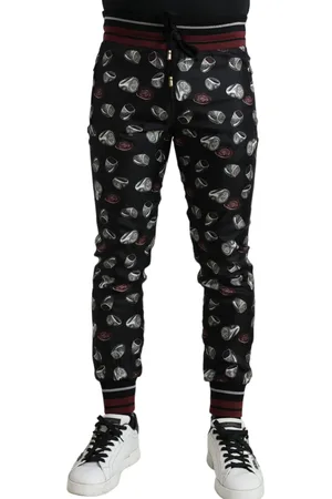 Dolce & Gabbana Elegant Silk Jogging Trousers with Ring Print - IT50 | L