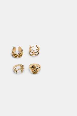 Stradivarius Set of 4 under the sea rings OS