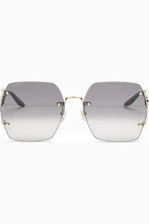 Gucci Gold and black hexagonal sunglasses