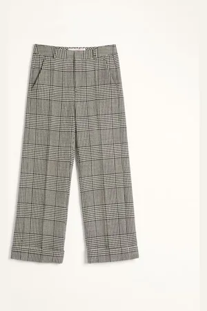 VALENTINO WOOL TROUSERS WITH TURN-UPS WITH CHECK PATTERN ON HOUNDSTOOTH Man 44