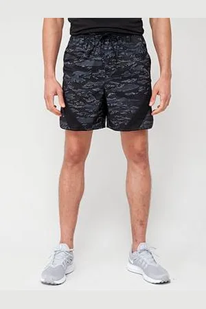 PUMA Train Concept Woven 7" Shorts