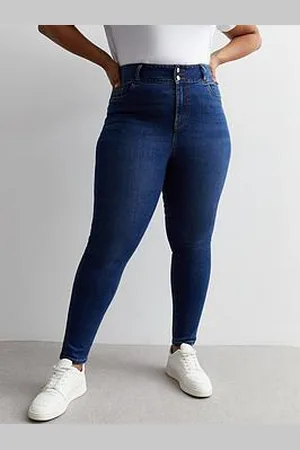 Blue Ripped Mid Rise Amie Skinny Jeans