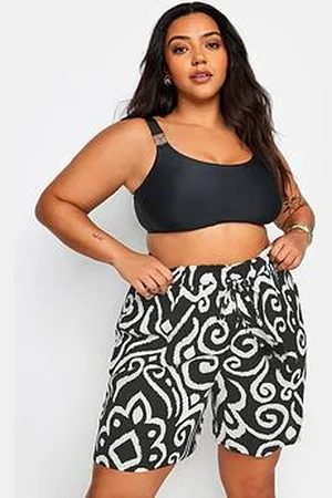 Yours Curve Monotone Woodblock Tassel Short