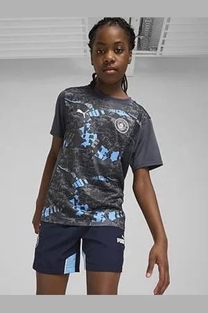 PUMA Junior Mcfc Prematch Short Sleeve Jersey