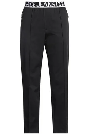 VERSACE BOTTOMWEAR - Trousers - on YOOX.com