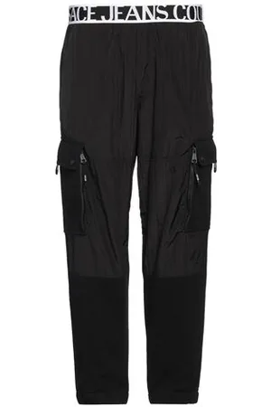 VERSACE BOTTOMWEAR - Trousers - on YOOX.com
