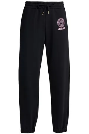 VERSACE BOTTOMWEAR - Trousers - on YOOX.com